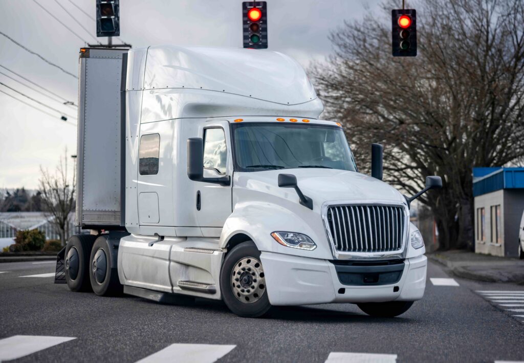 Commercial truck approaching a signalized intersection