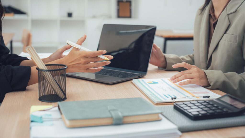 Claims and safety professionals reviewing crash documentation